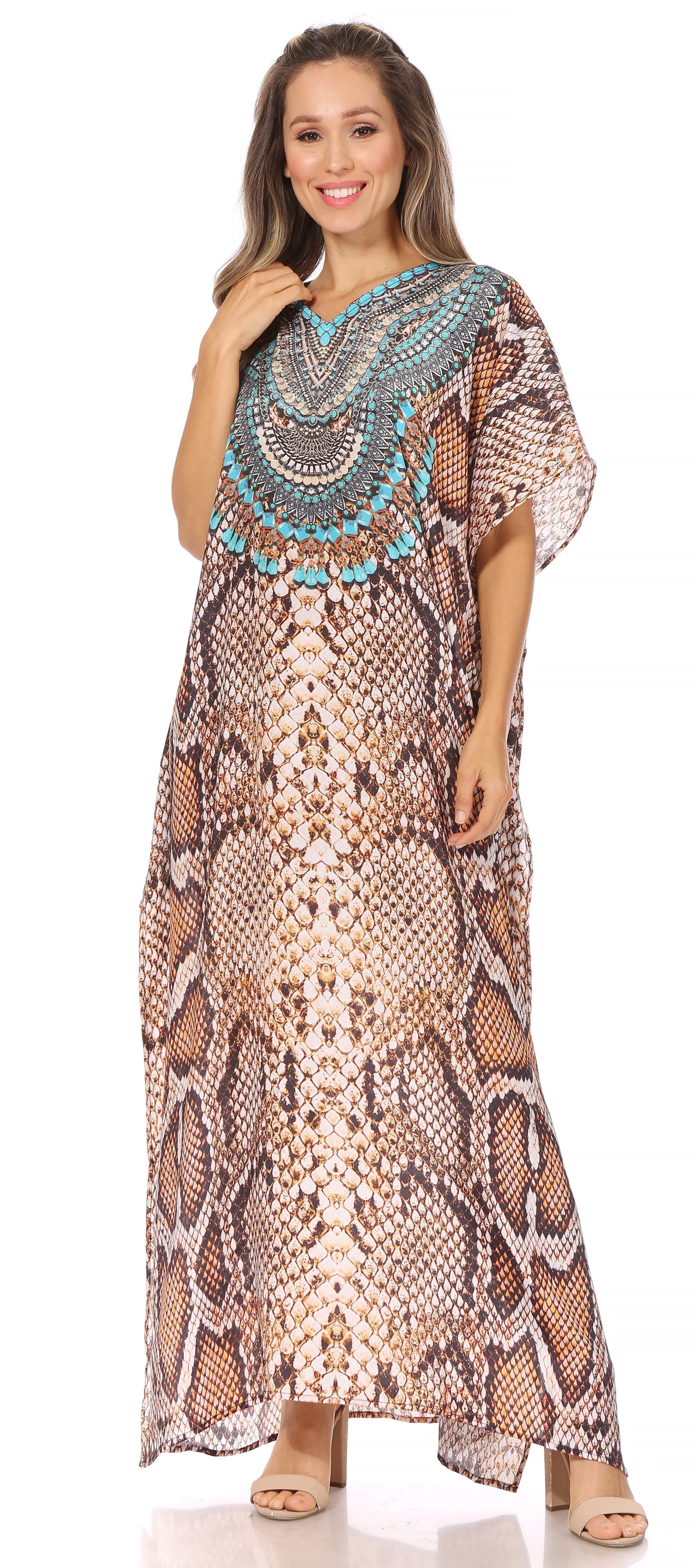 Woman wearing a long snake print dress with a patterned top on a white background