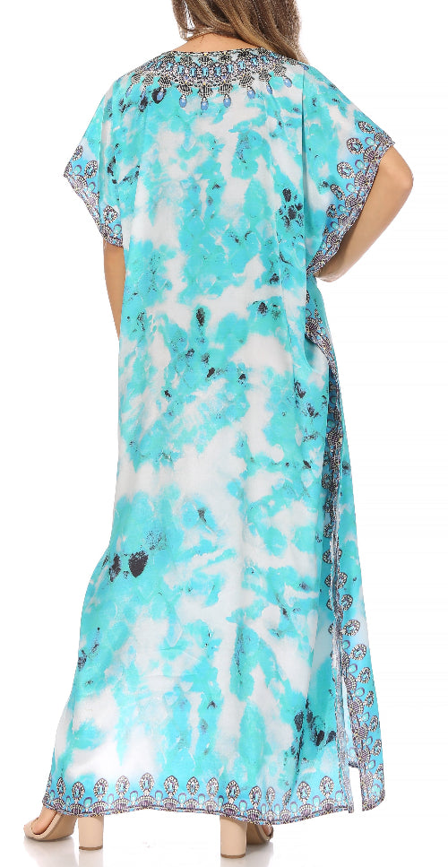 Turquoise and white patterned dress worn by a person on a white background