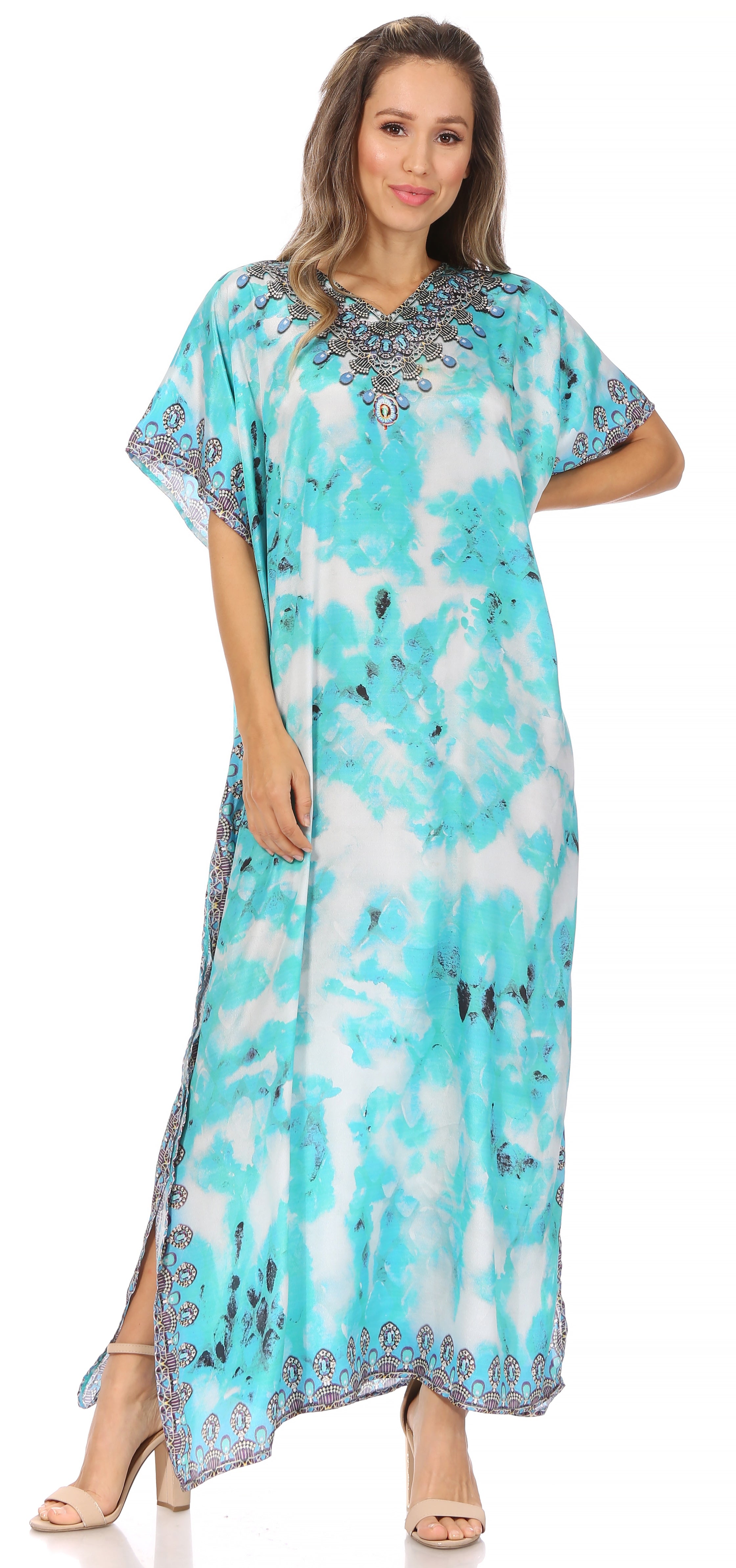 Woman wearing a blue and white patterned dress on a white background