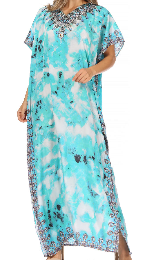 Turquoise and white patterned dress with embellishments on a white background