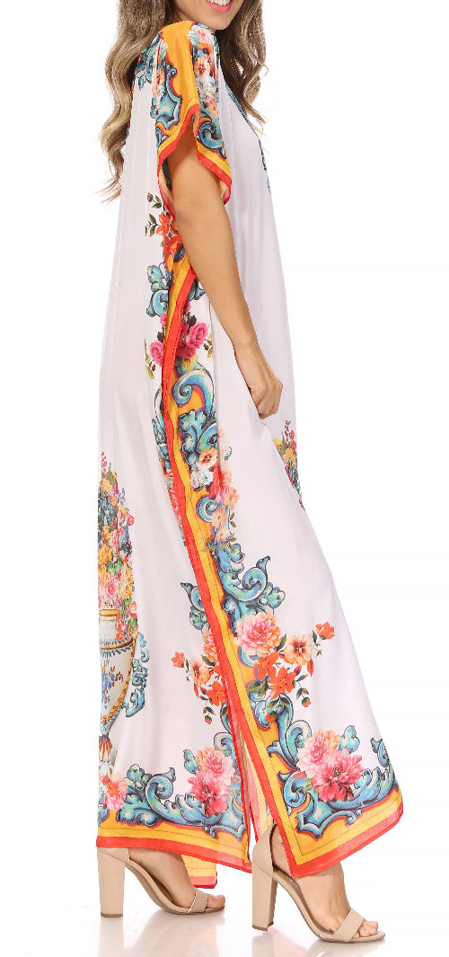 Woman wearing a colorful floral dress on a white background