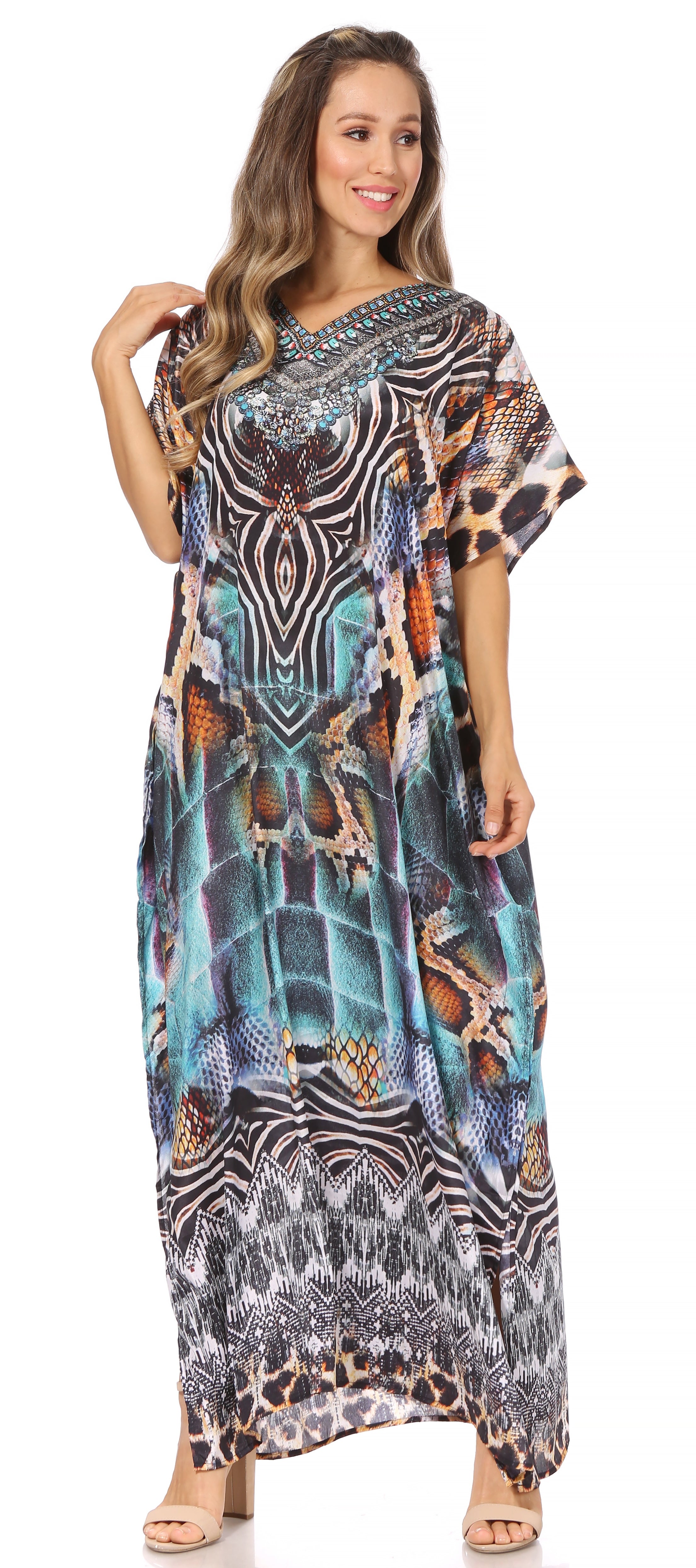 Woman wearing a long, patterned dress with a white background