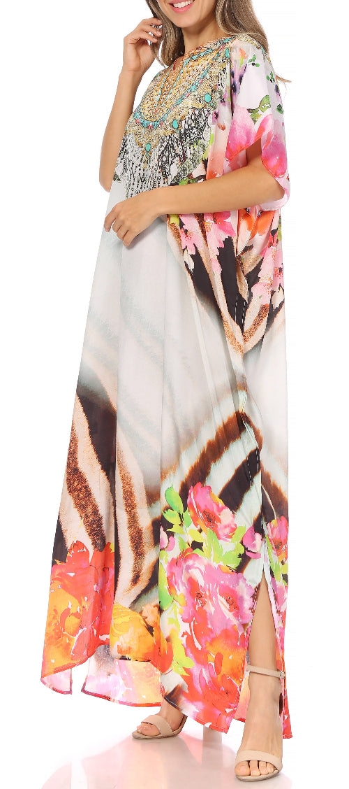 Colorful floral and abstract patterned dress worn by a model on a white background