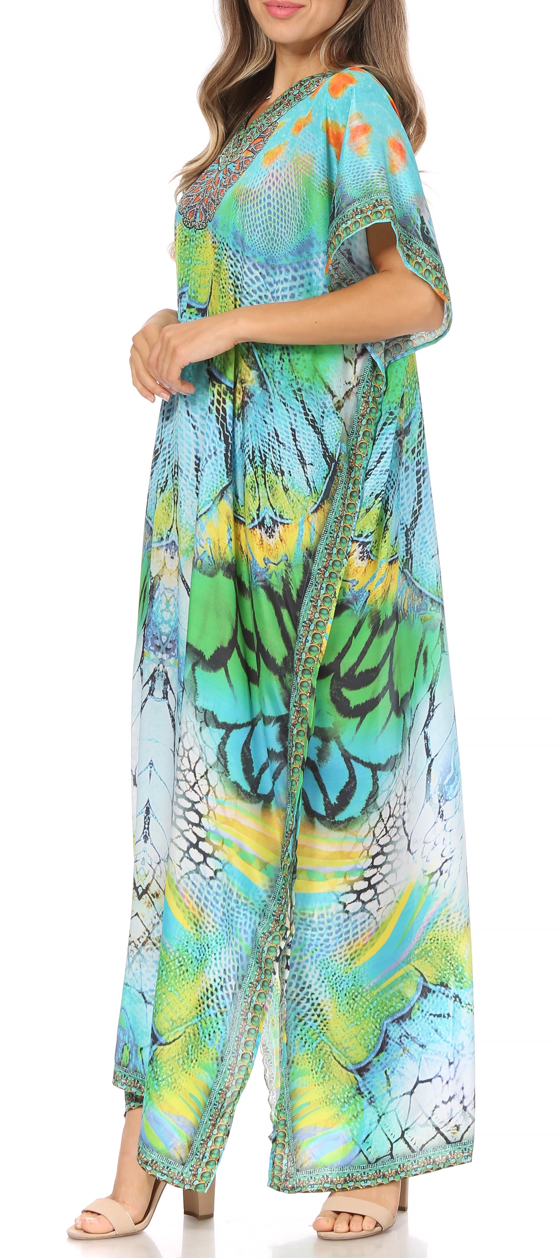 Woman wearing a colorful patterned dress on a white background
