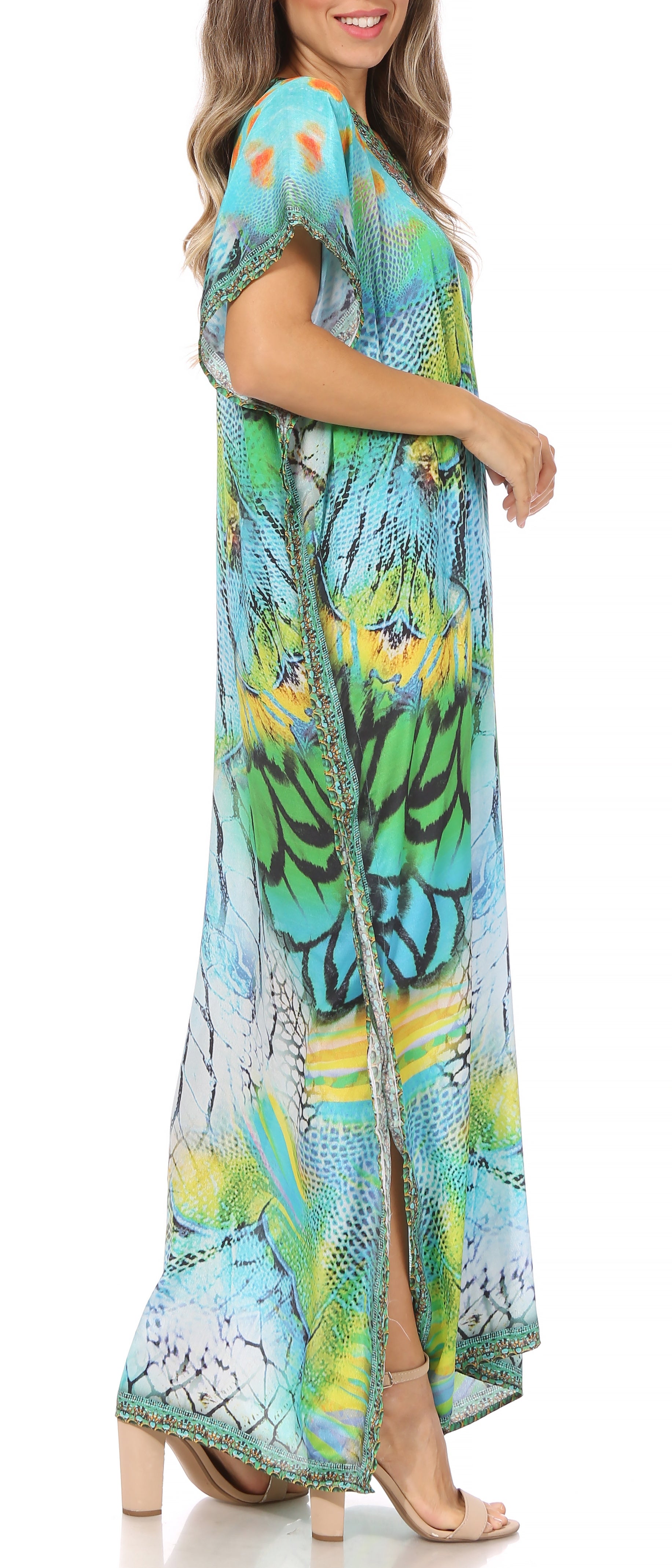 Woman wearing a colorful patterned dress on a white background