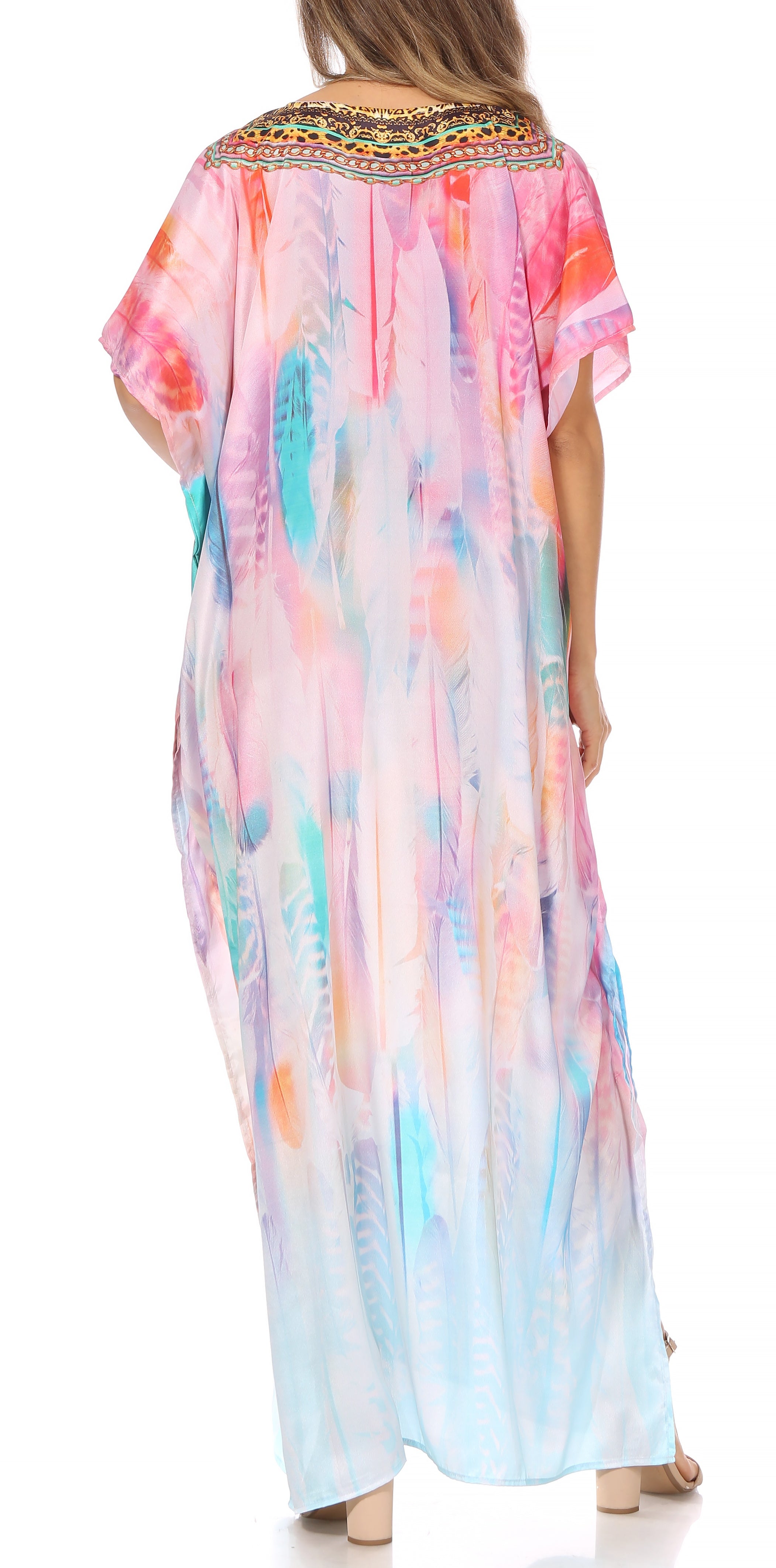 Woman wearing a colorful, watercolor-style dress with a white background