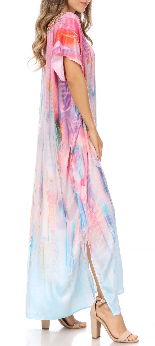 Woman wearing a colorful tie-dye dress with a blurred background