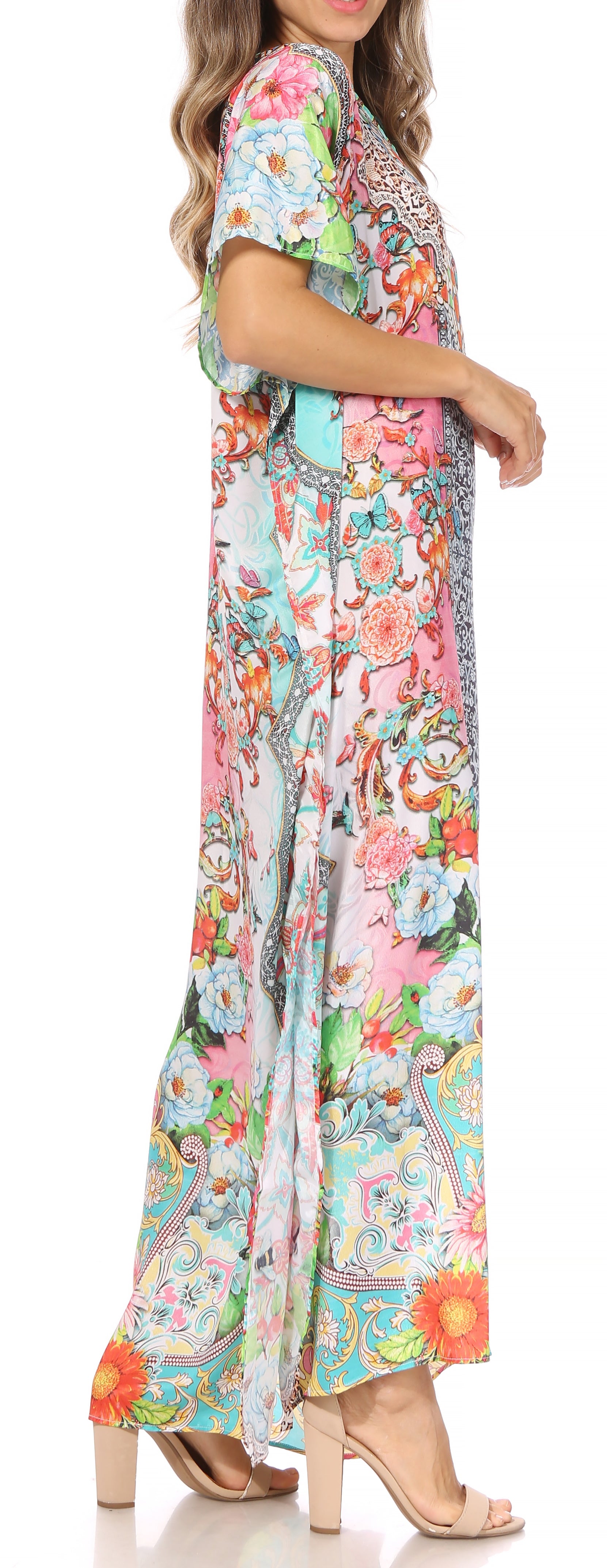 Woman wearing a colorful floral dress with a blurred background