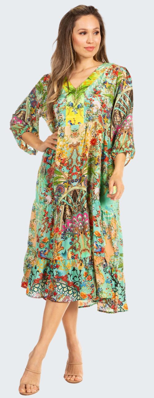 Woman wearing a colorful floral dress on a white background