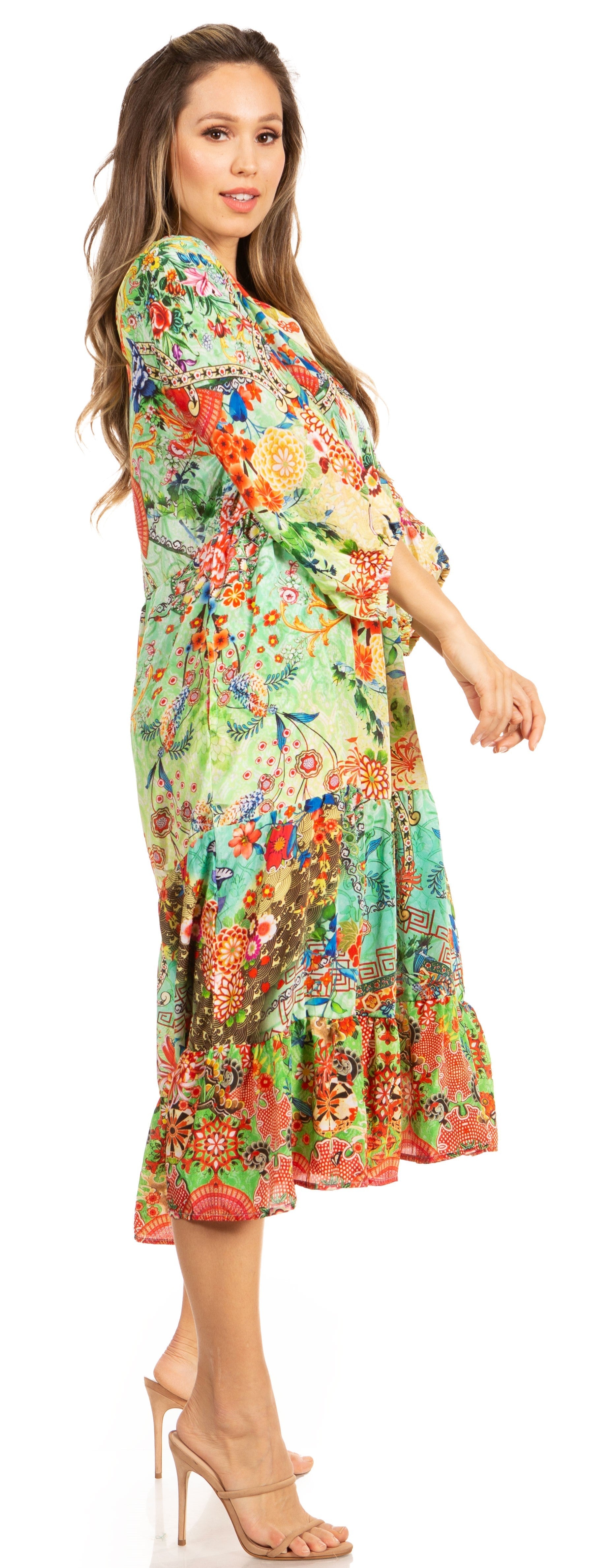 Woman wearing a colorful floral dress on a white background