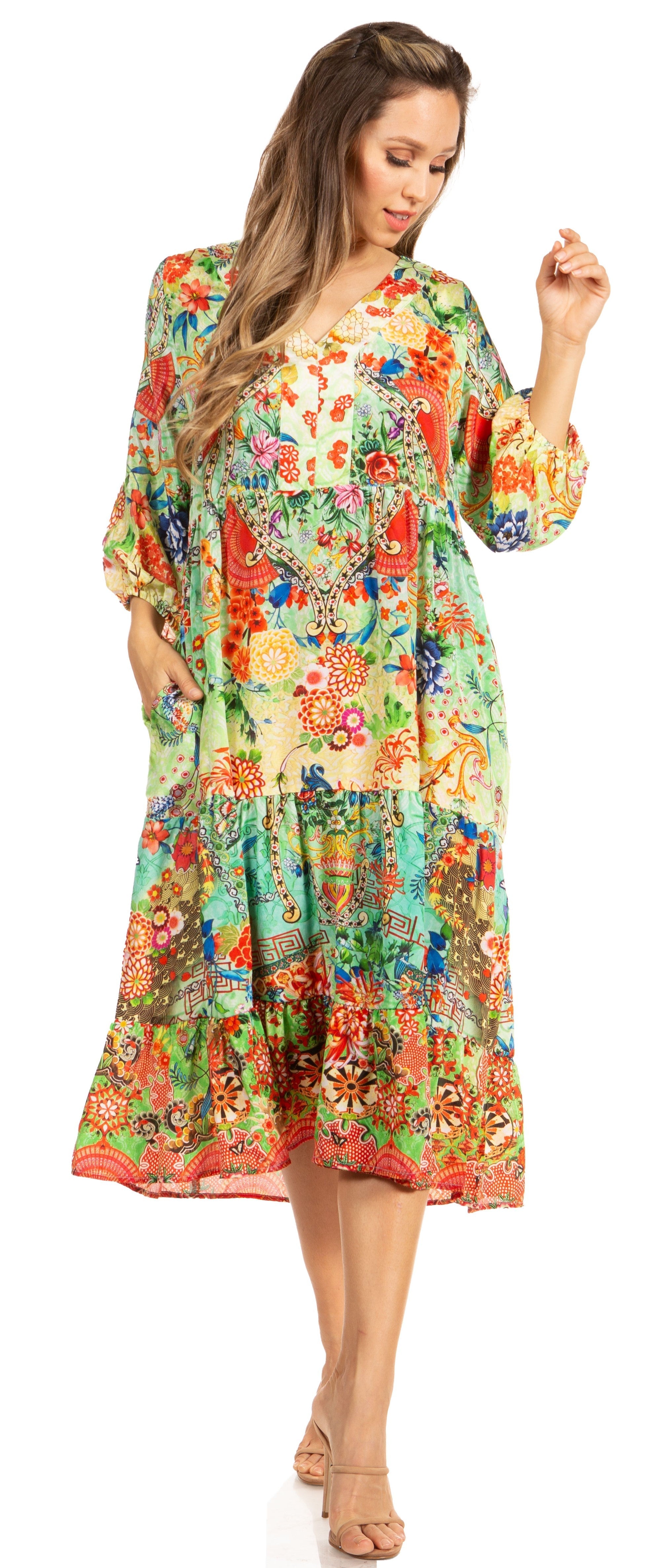 Woman wearing a colorful floral dress on a white background