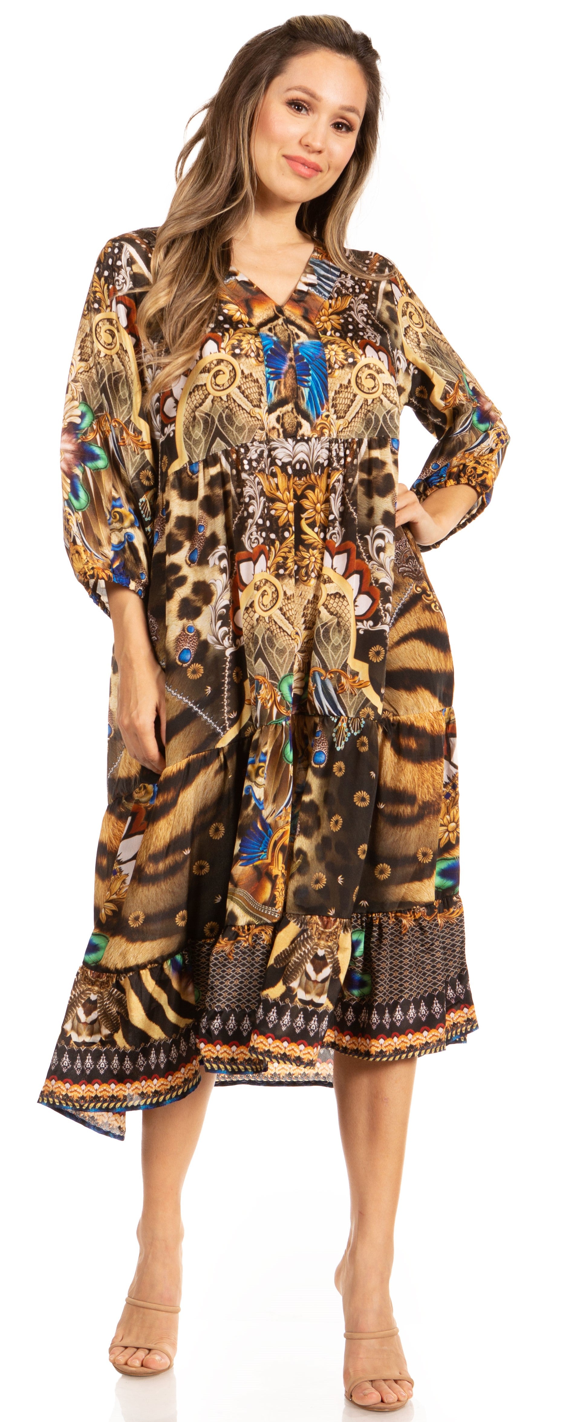 Woman wearing a long, patterned dress with a white background