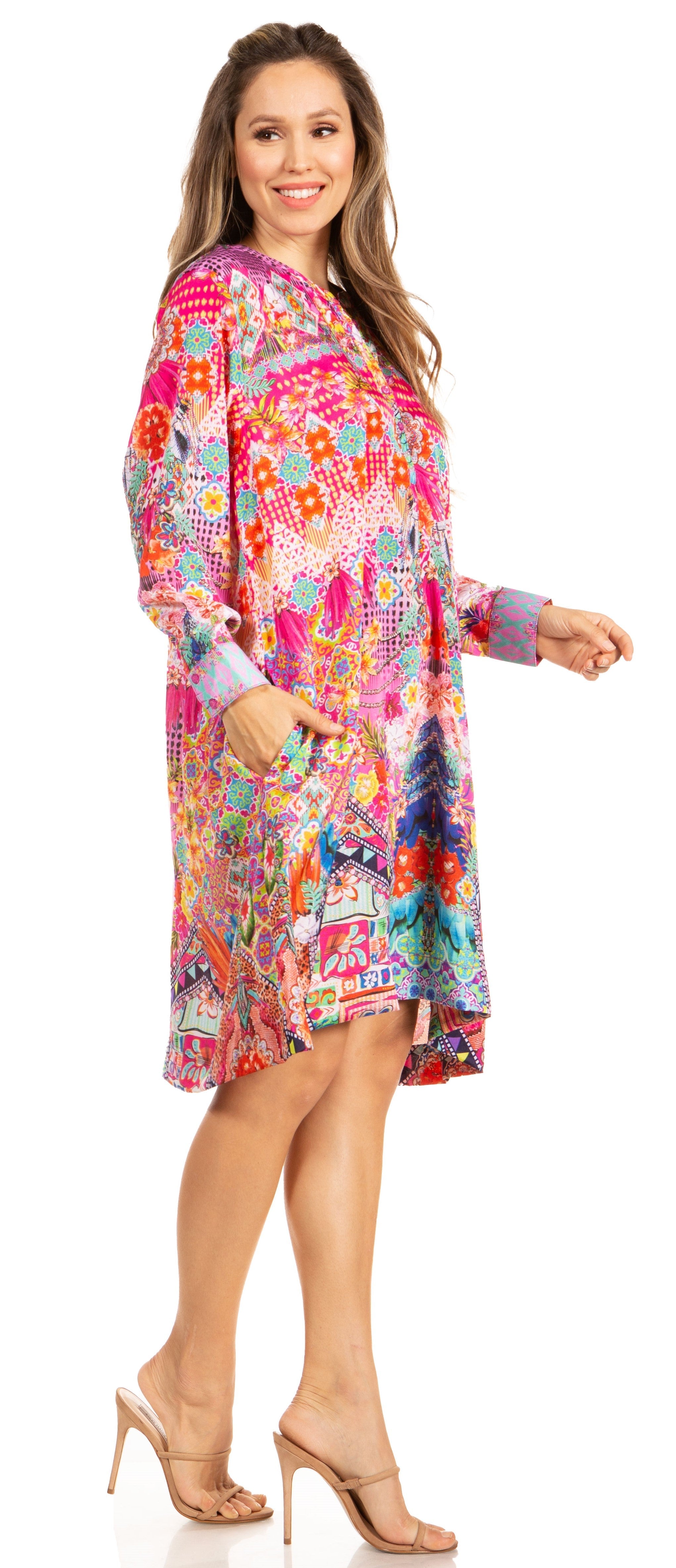 Woman wearing a colorful patterned dress on a white background