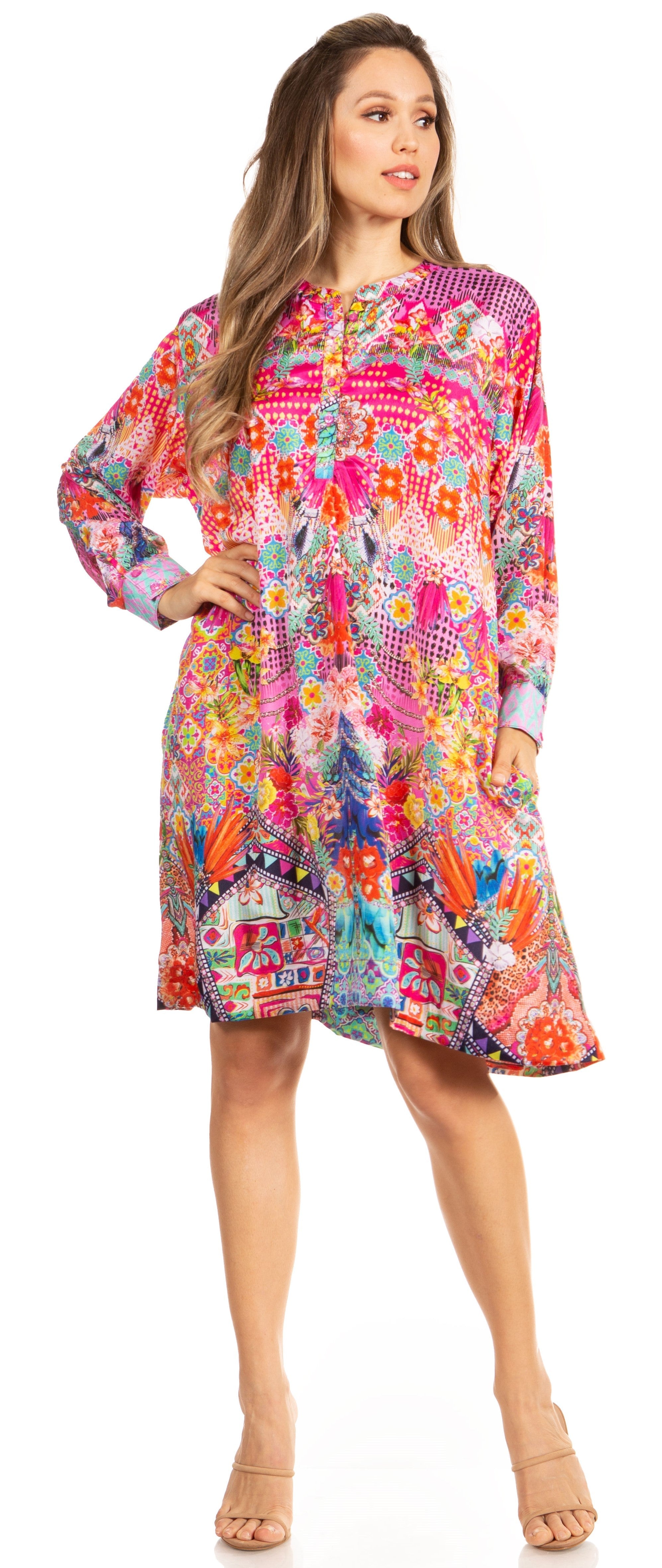 Woman wearing a colorful patterned dress on a white background