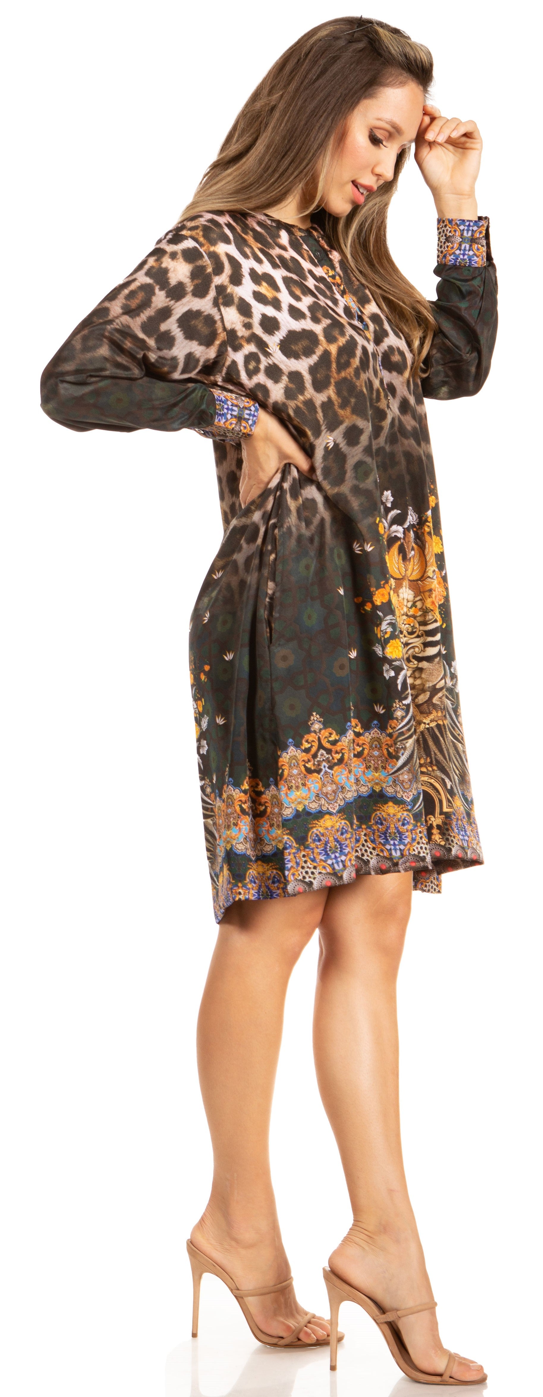 Woman wearing a leopard print dress with floral patterns on a white background