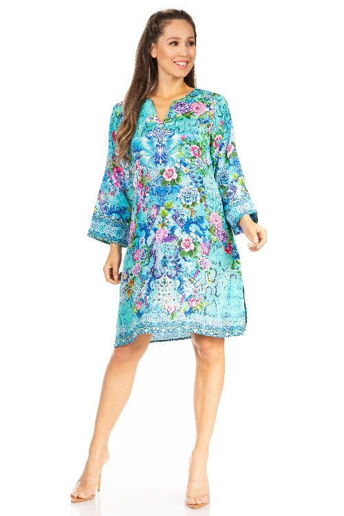 Woman wearing a floral dress on a white background