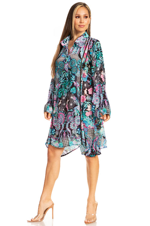 Woman wearing a colorful patterned dress on a white background