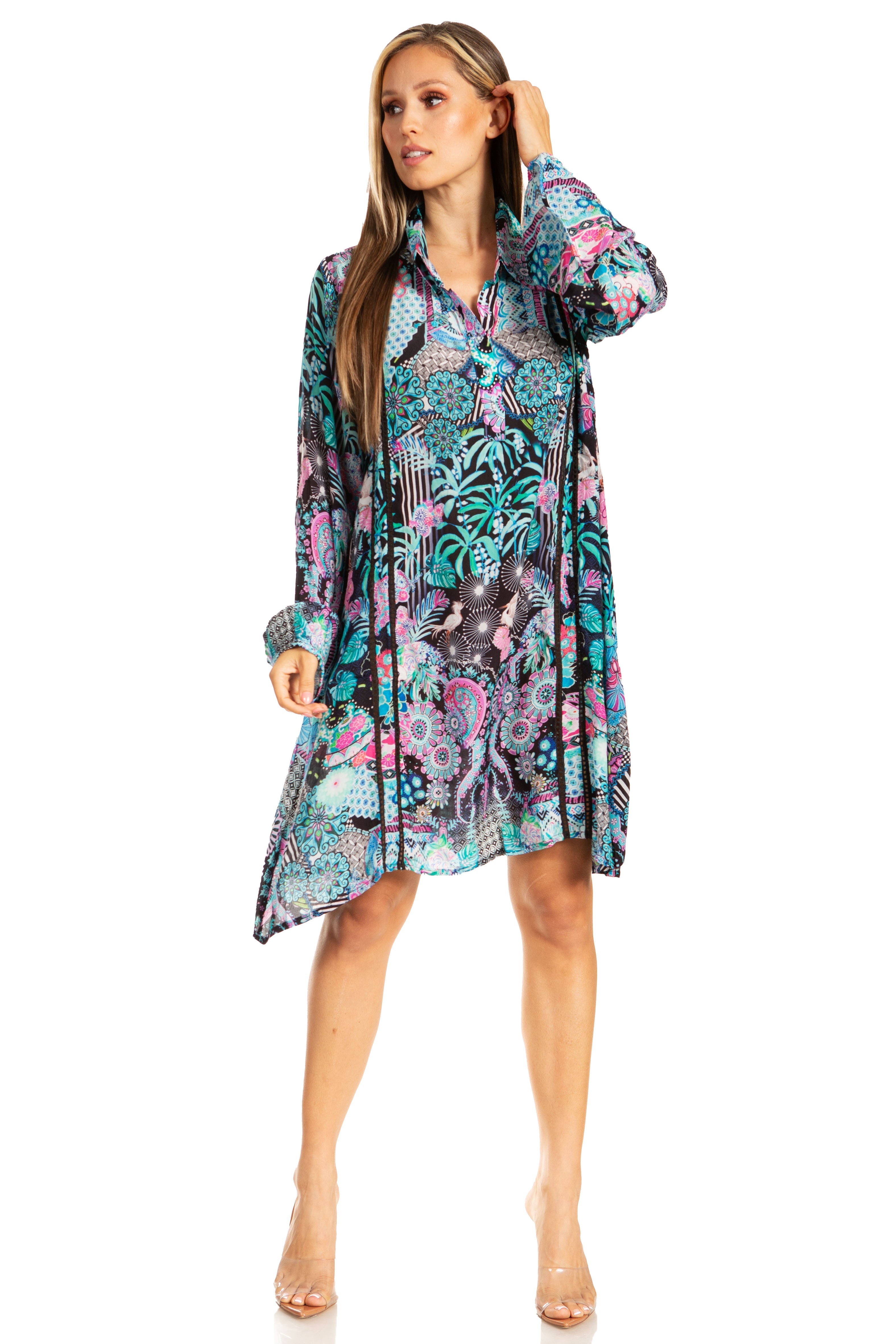 Woman wearing a colorful patterned dress on a white background