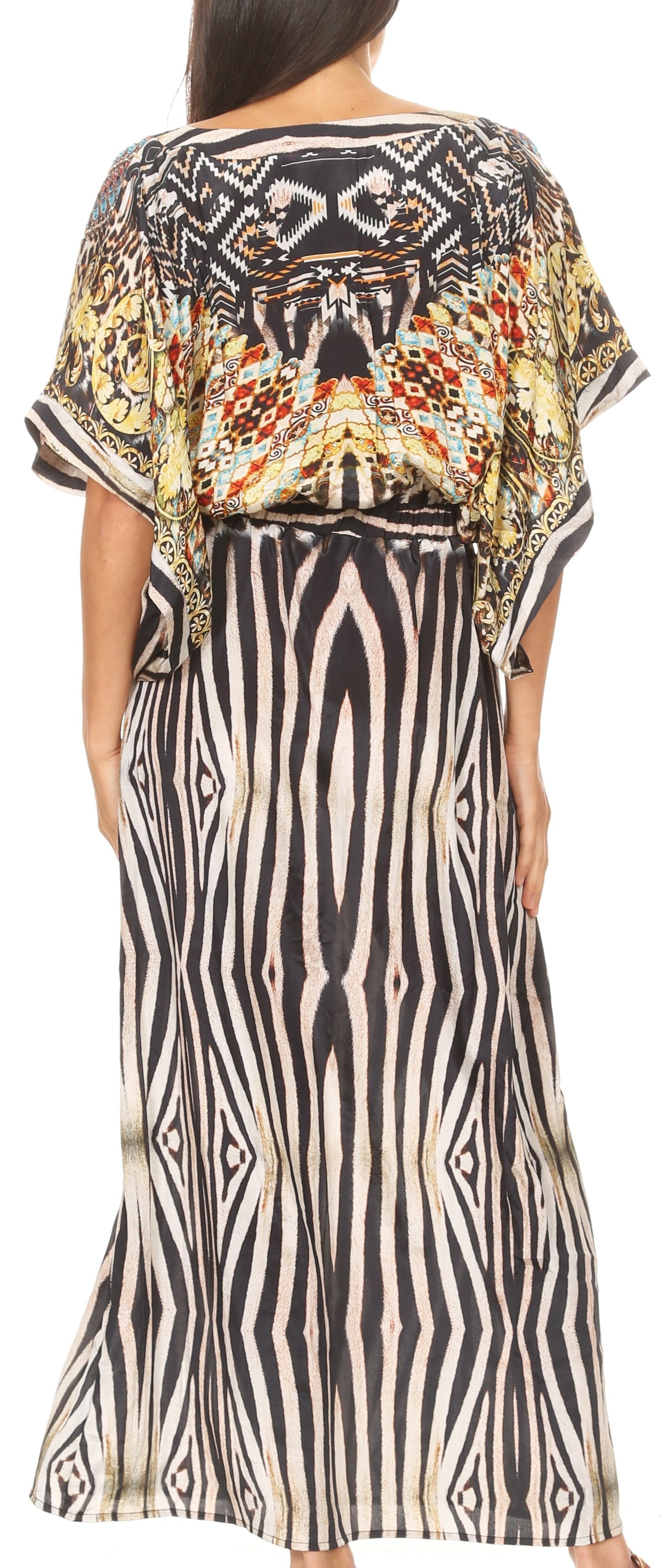 Woman wearing a dress with a patterned top and zebra-striped skirt.