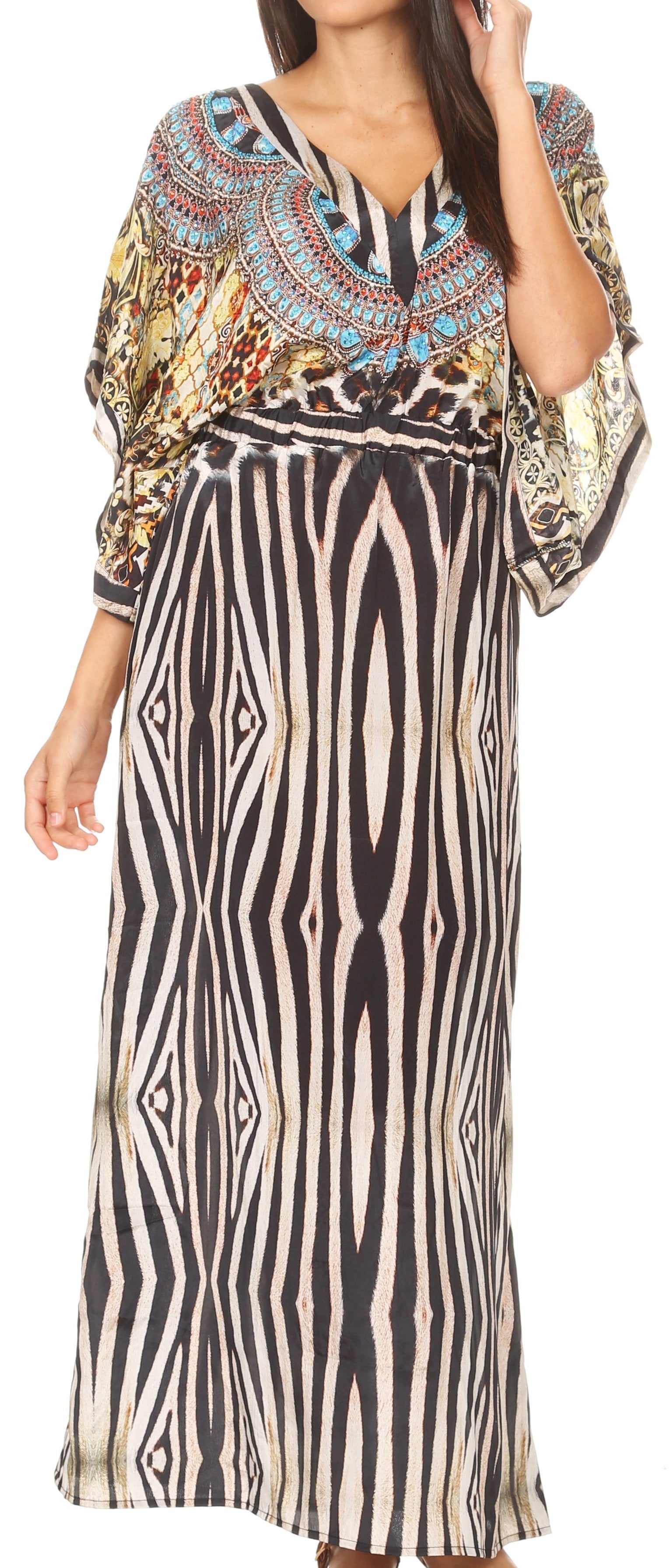Woman wearing a long dress with a patterned top and zebra-striped skirt.