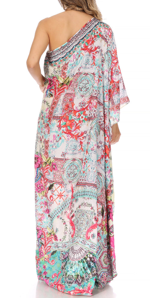 Colorful one-shoulder dress with floral and paisley patterns on a white background