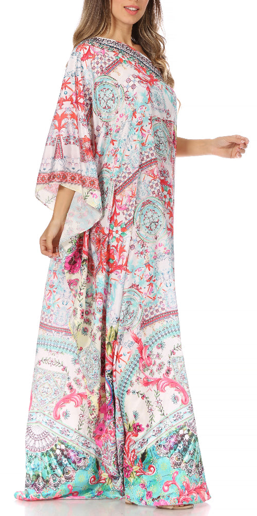 Woman wearing a colorful floral dress with bell sleeves on a white background