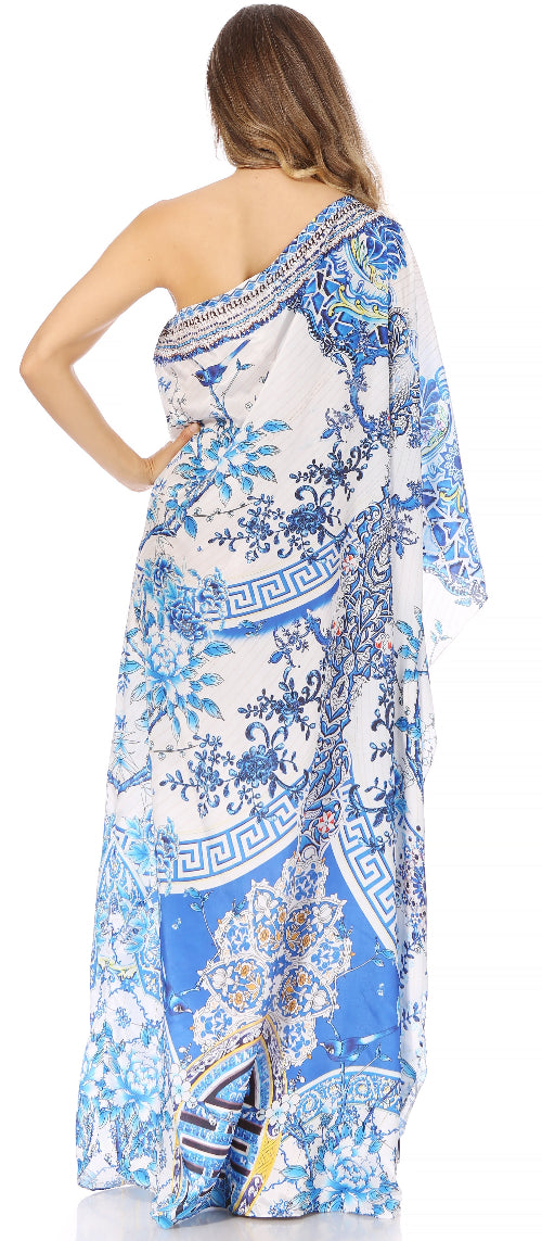 Woman wearing a blue and white patterned dress on a white background