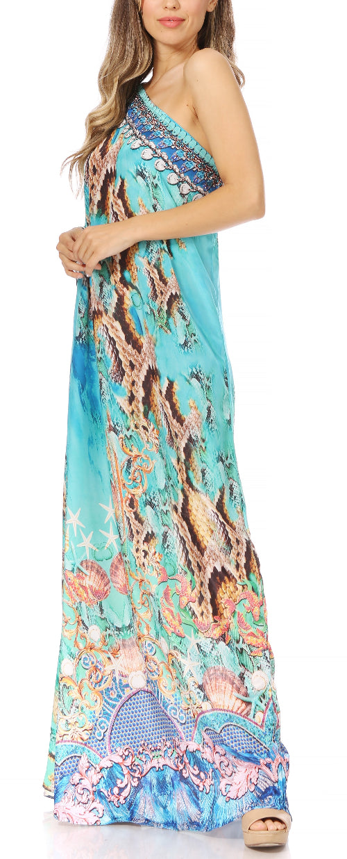 Woman wearing a colorful one-shoulder dress with a floral pattern.
