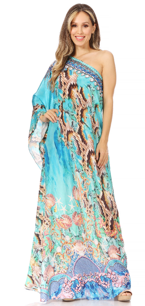 Woman wearing a colorful one-shoulder dress with a floral pattern on a white background