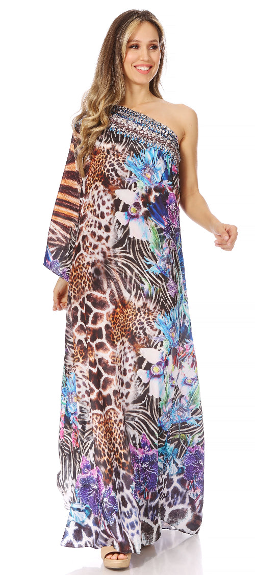 Woman wearing a colorful one-shoulder dress with animal print and floral patterns on a white background
