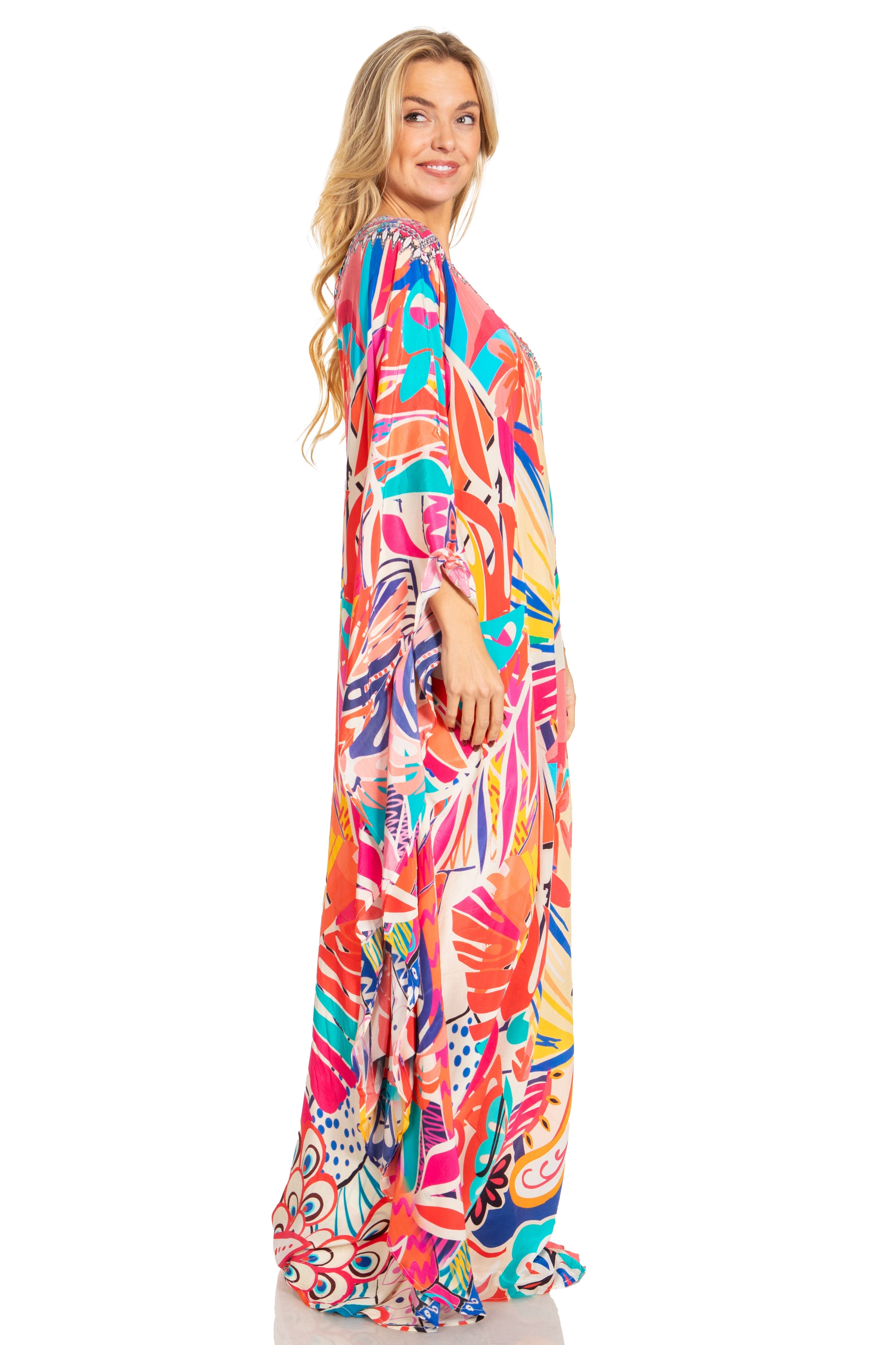 Woman wearing a colorful patterned dress on a white background