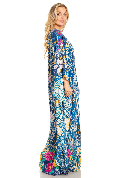 Woman wearing a long floral dress on a white background