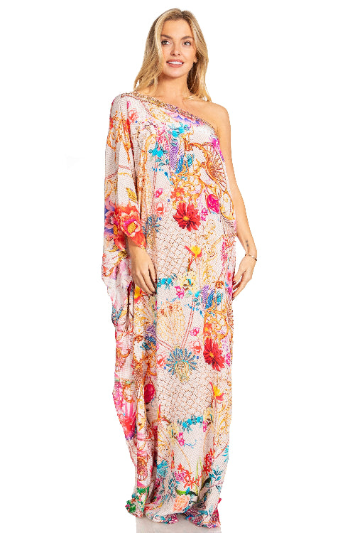 Woman wearing a colorful floral dress on a white background