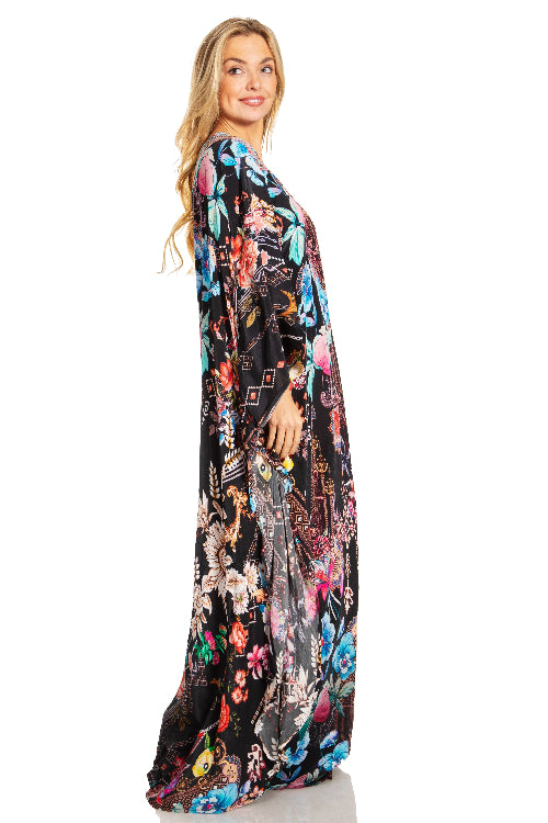 Woman wearing a long, floral-patterned dress on a white background