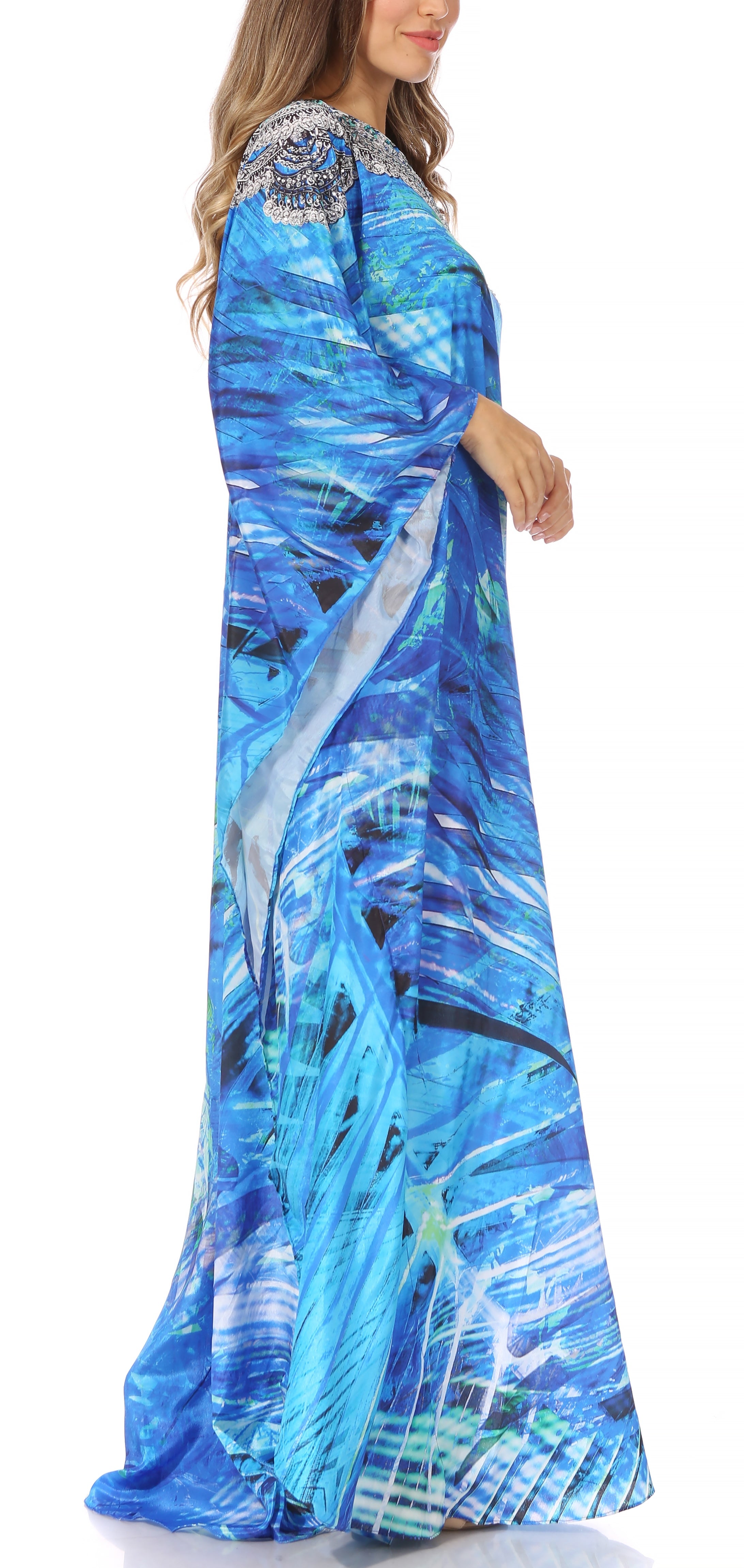 Woman wearing a blue abstract patterned dress on a white background