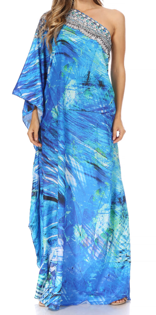 Blue patterned one-shoulder dress with embellishments on a white background