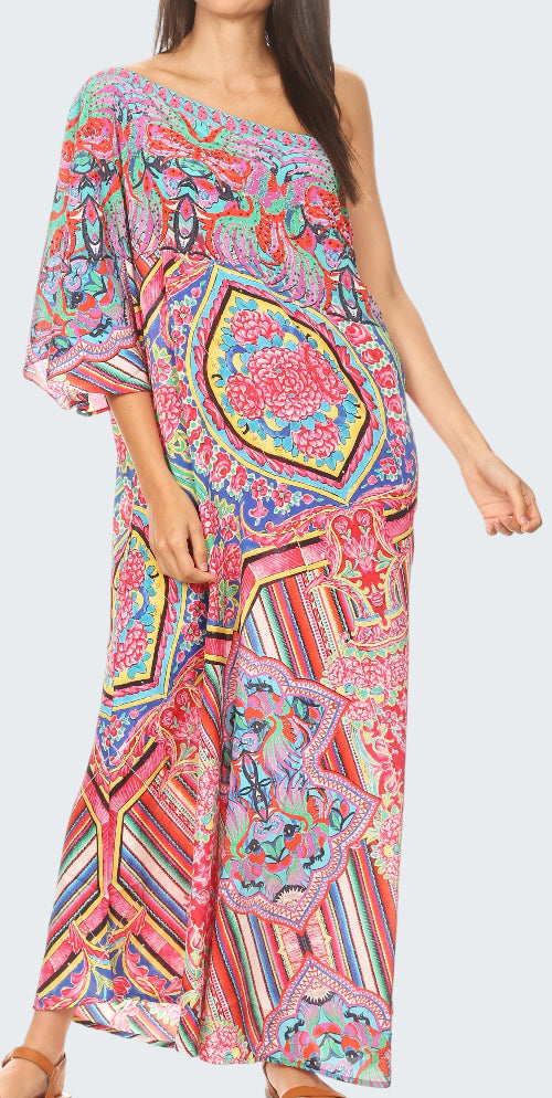 Woman wearing a colorful patterned dress on a white background