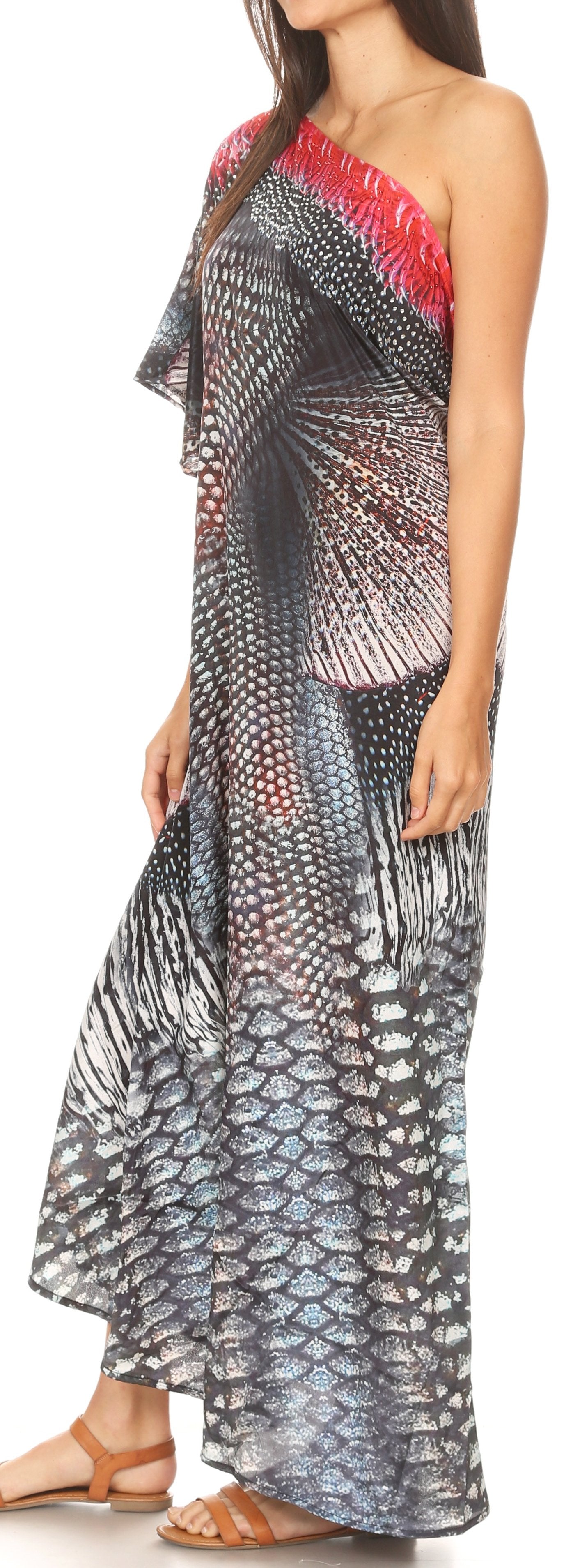 Woman wearing a one-shoulder dress with a geometric pattern