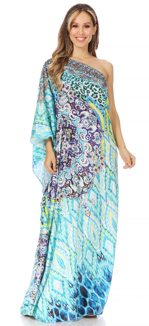 Woman wearing a colorful one-shoulder dress with a pattern on a white background