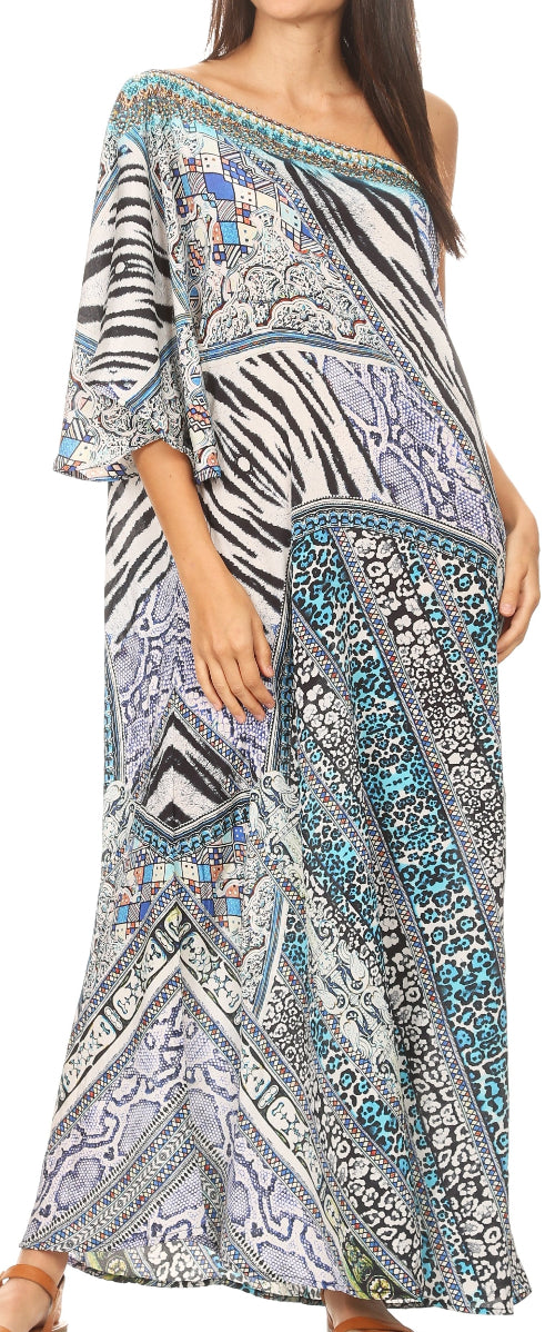 Woman wearing a patterned off-shoulder dress with zebra and abstract designs.