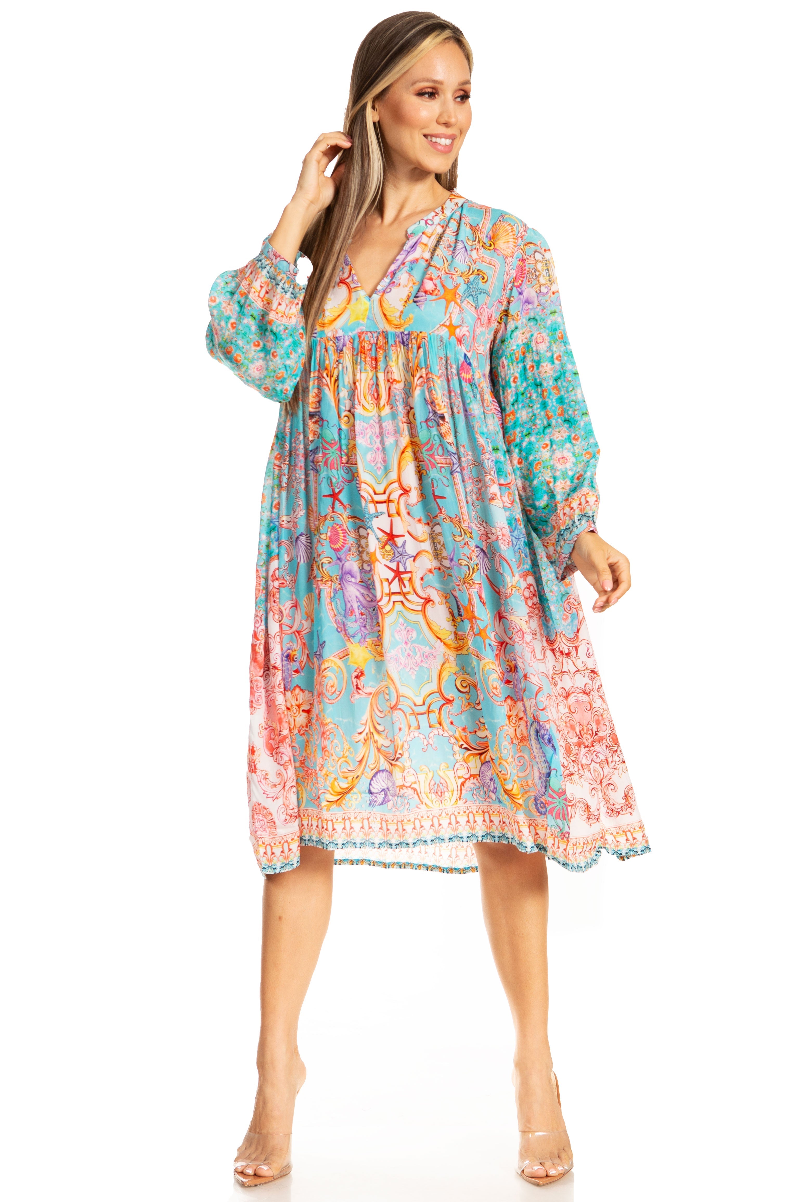 Woman wearing a colorful patterned dress on a white background
