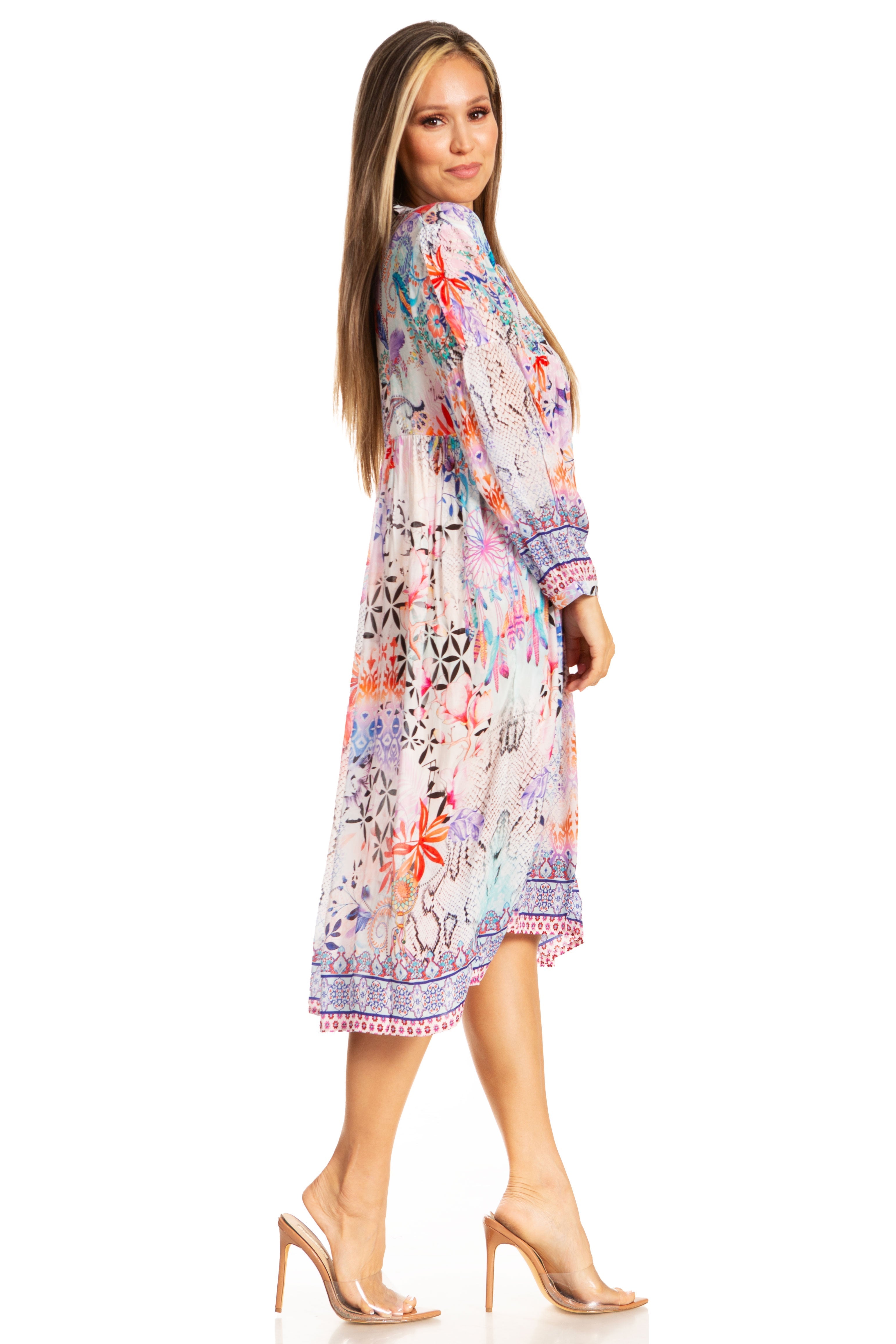 Woman wearing a colorful floral dress on a white background