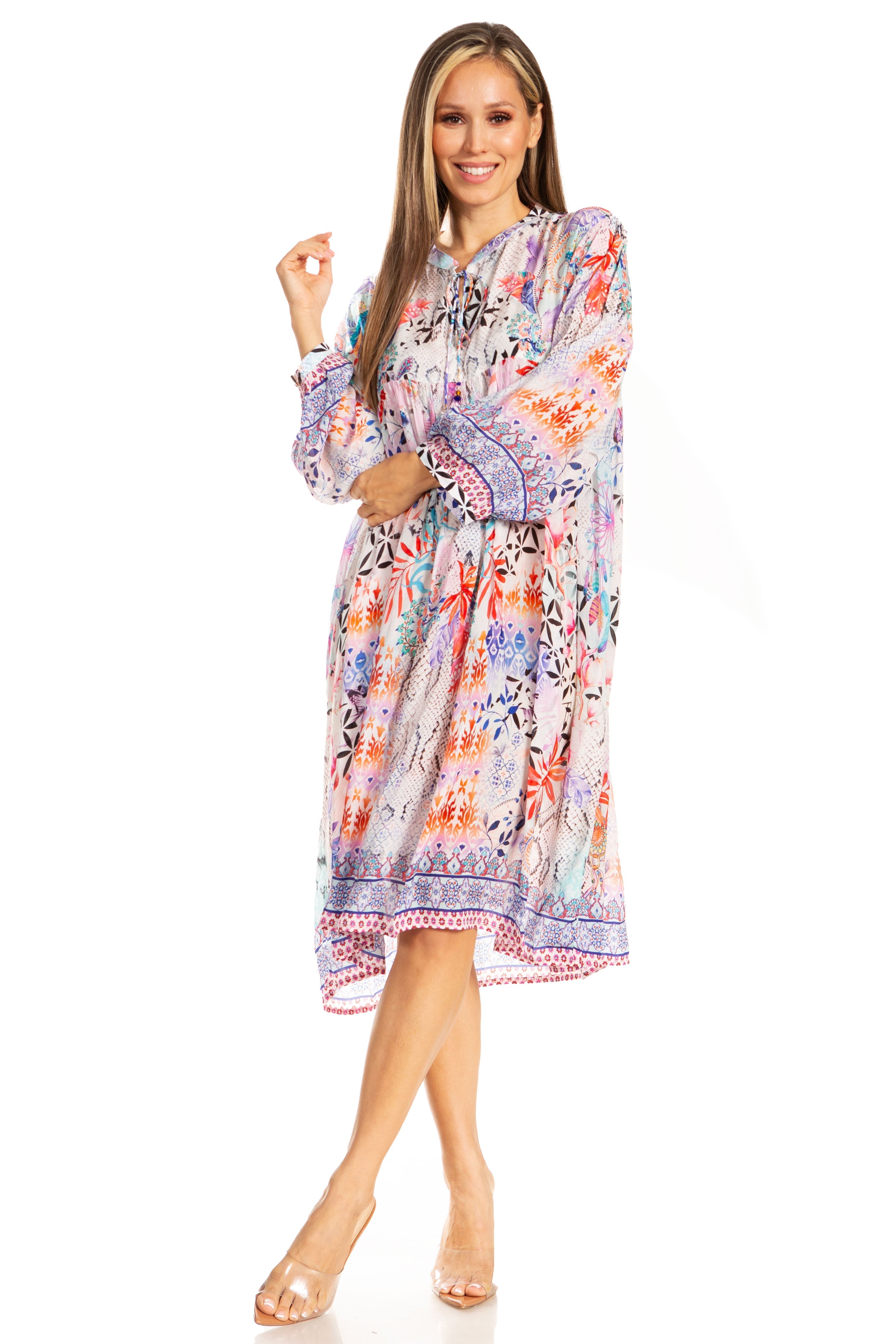 Woman wearing a colorful floral dress on a white background
