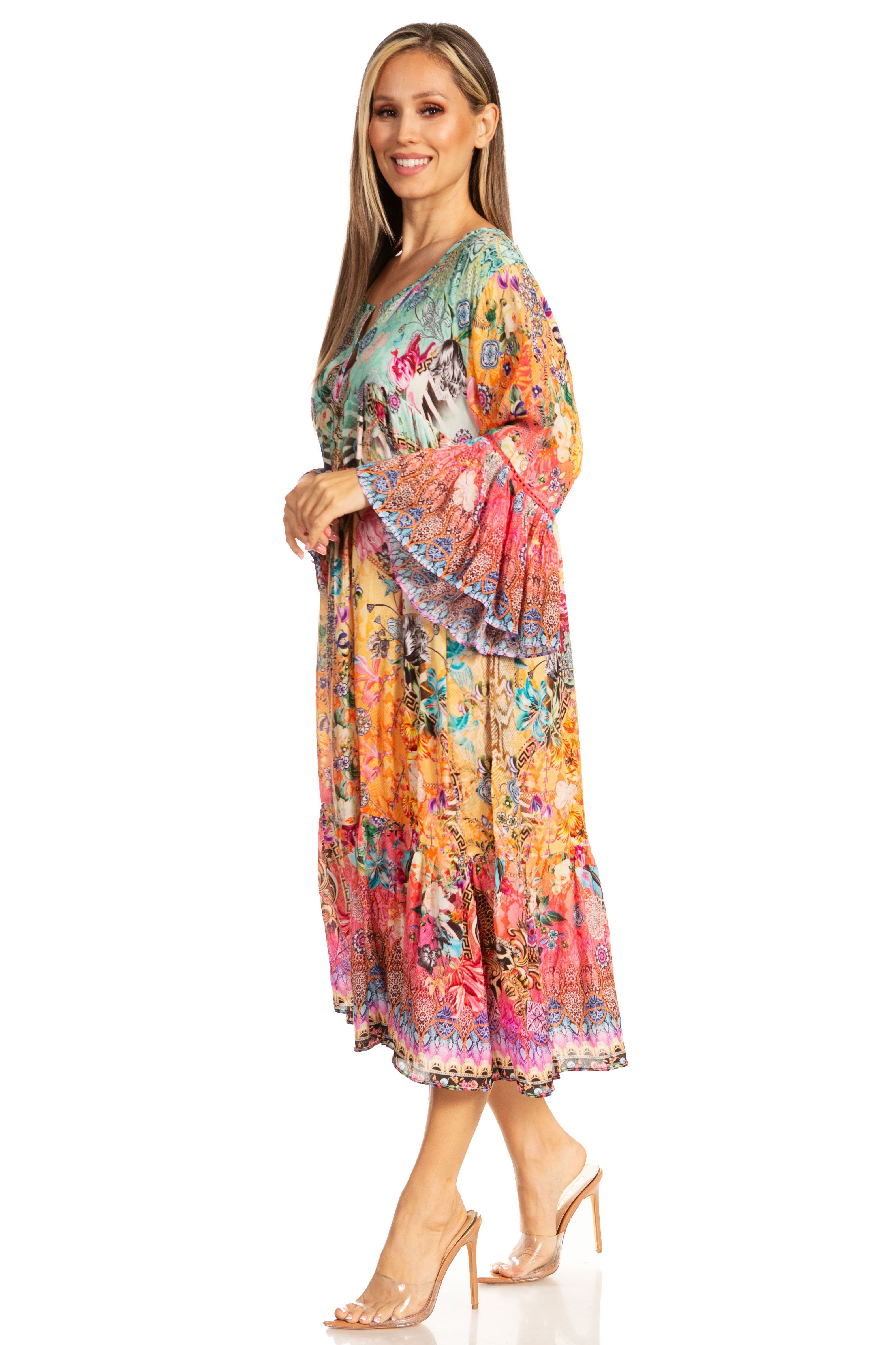 Woman wearing a colorful floral dress on a white background