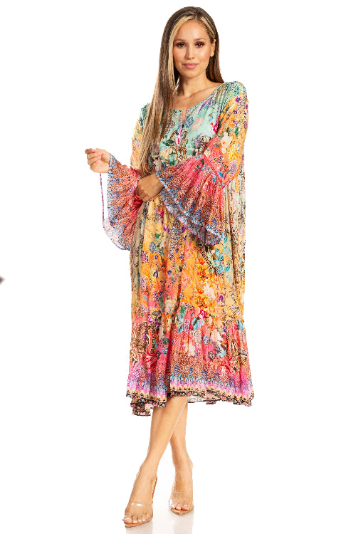 Woman wearing a colorful floral dress on a white background