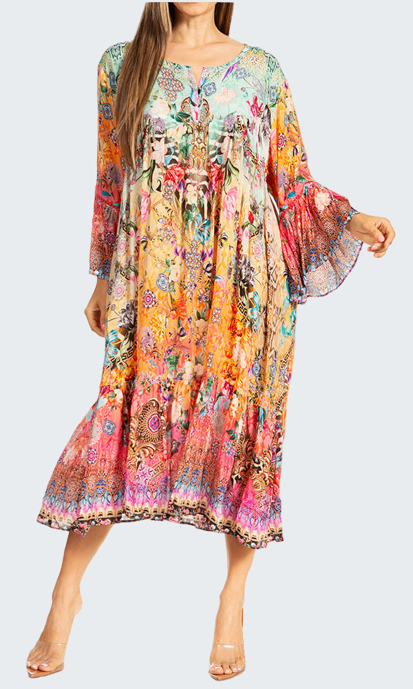 Woman wearing a colorful floral dress on a white background