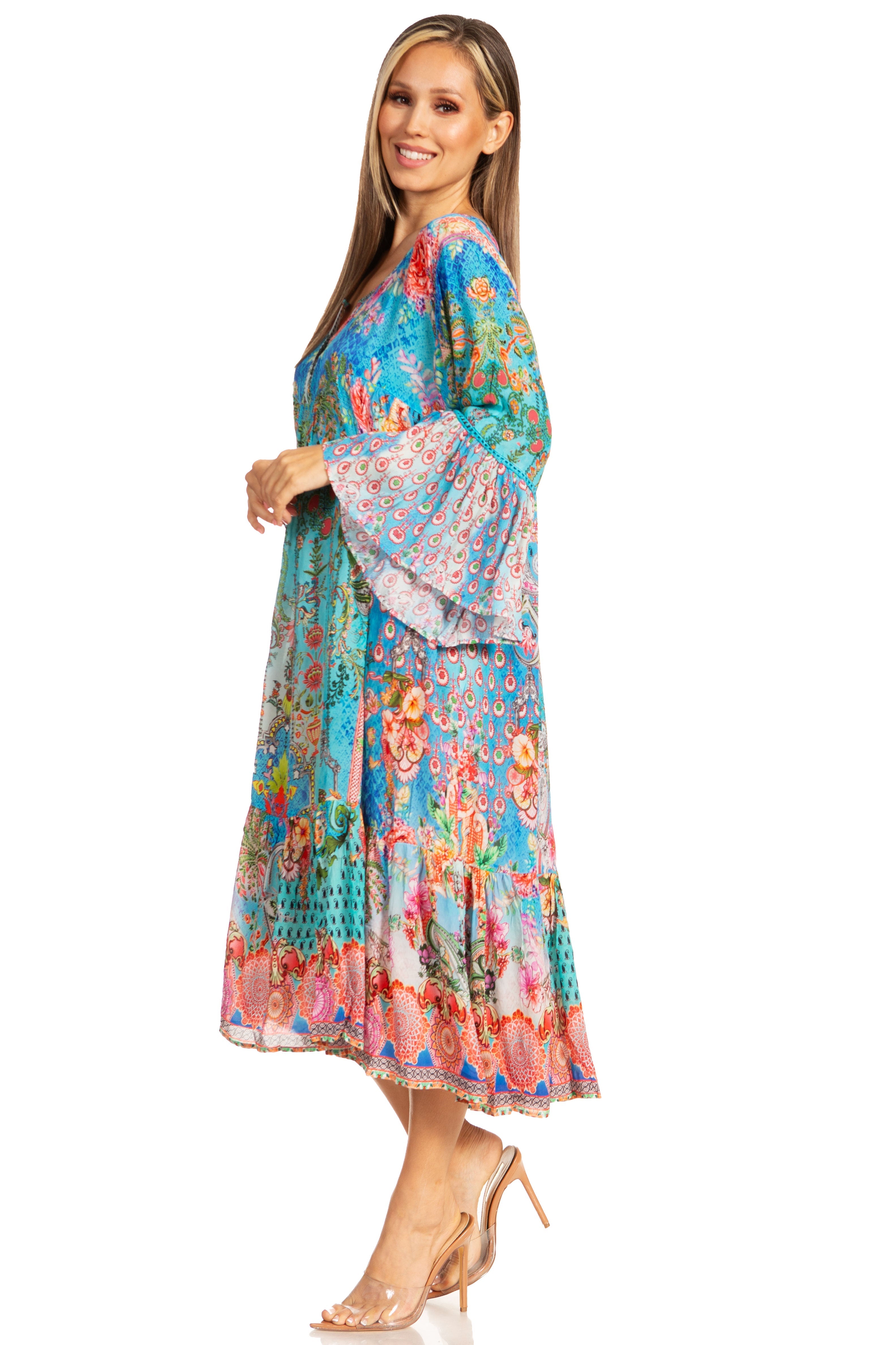 Woman wearing a colorful floral dress on a white background