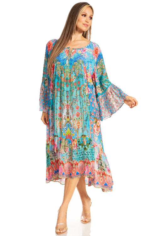 Woman wearing a colorful floral dress on a white background