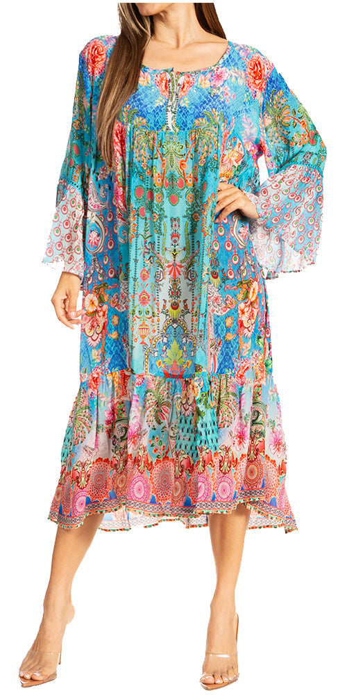 Woman wearing a colorful floral dress with bell sleeves on a white background
