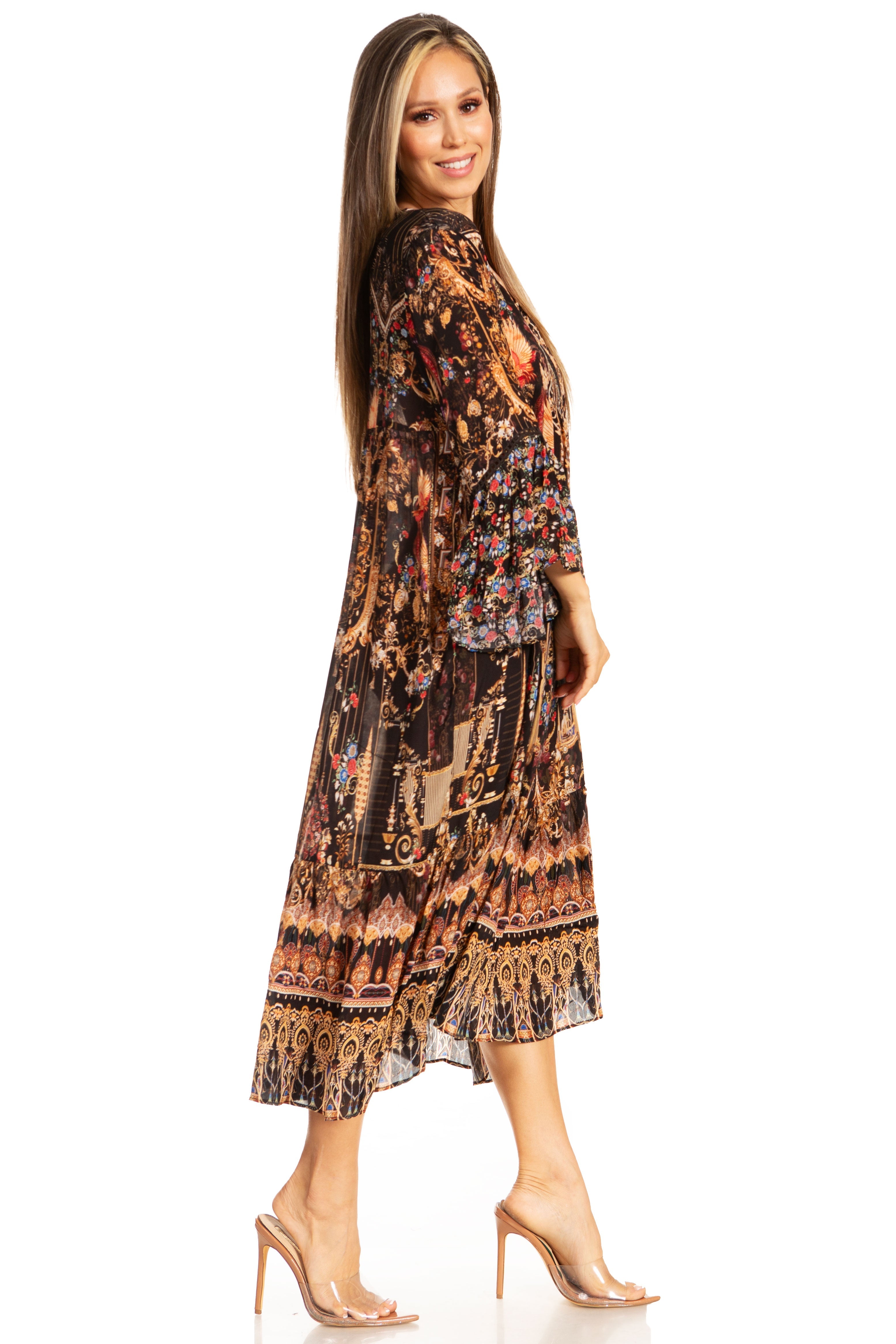 Woman wearing a patterned dress on a white background